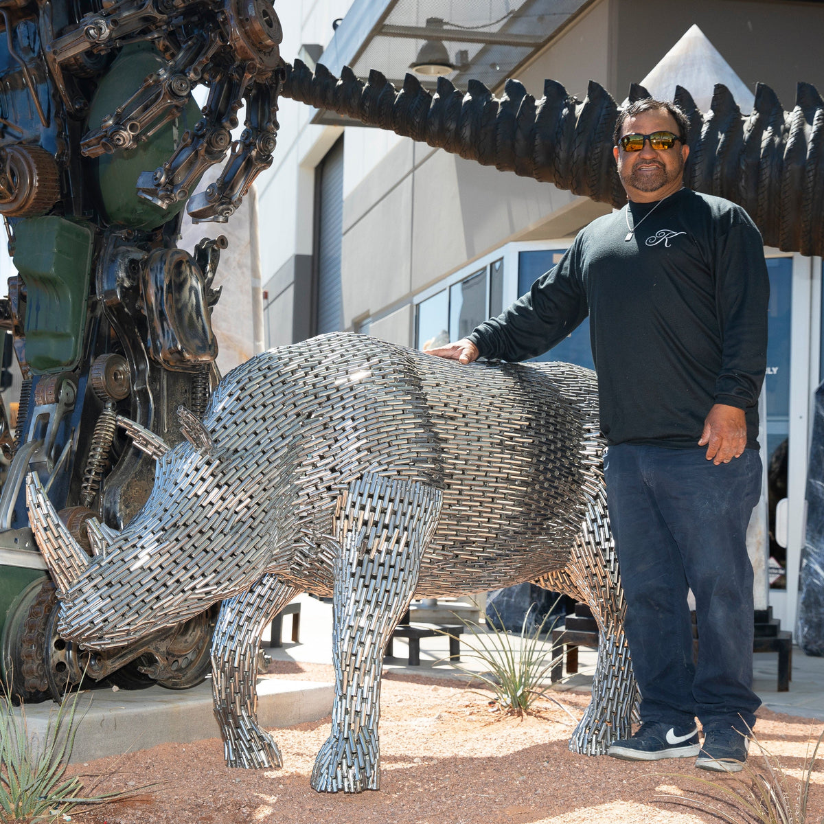 Kalifano Recycled Metal Art Stainless Steel Pipe Walking Rhino SSS-R216