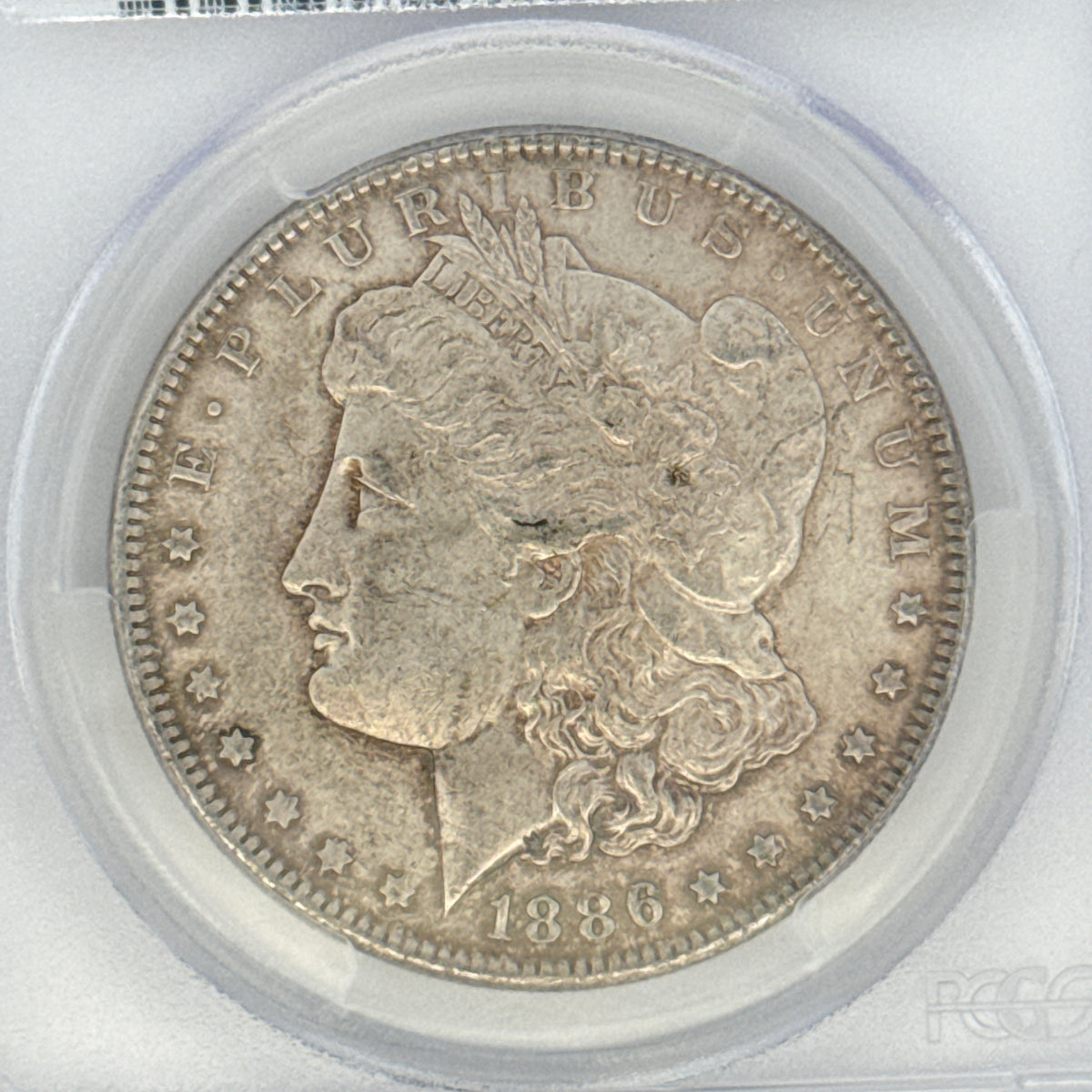 1886 Morgan Silver Dollar AU55 PCGS Graded