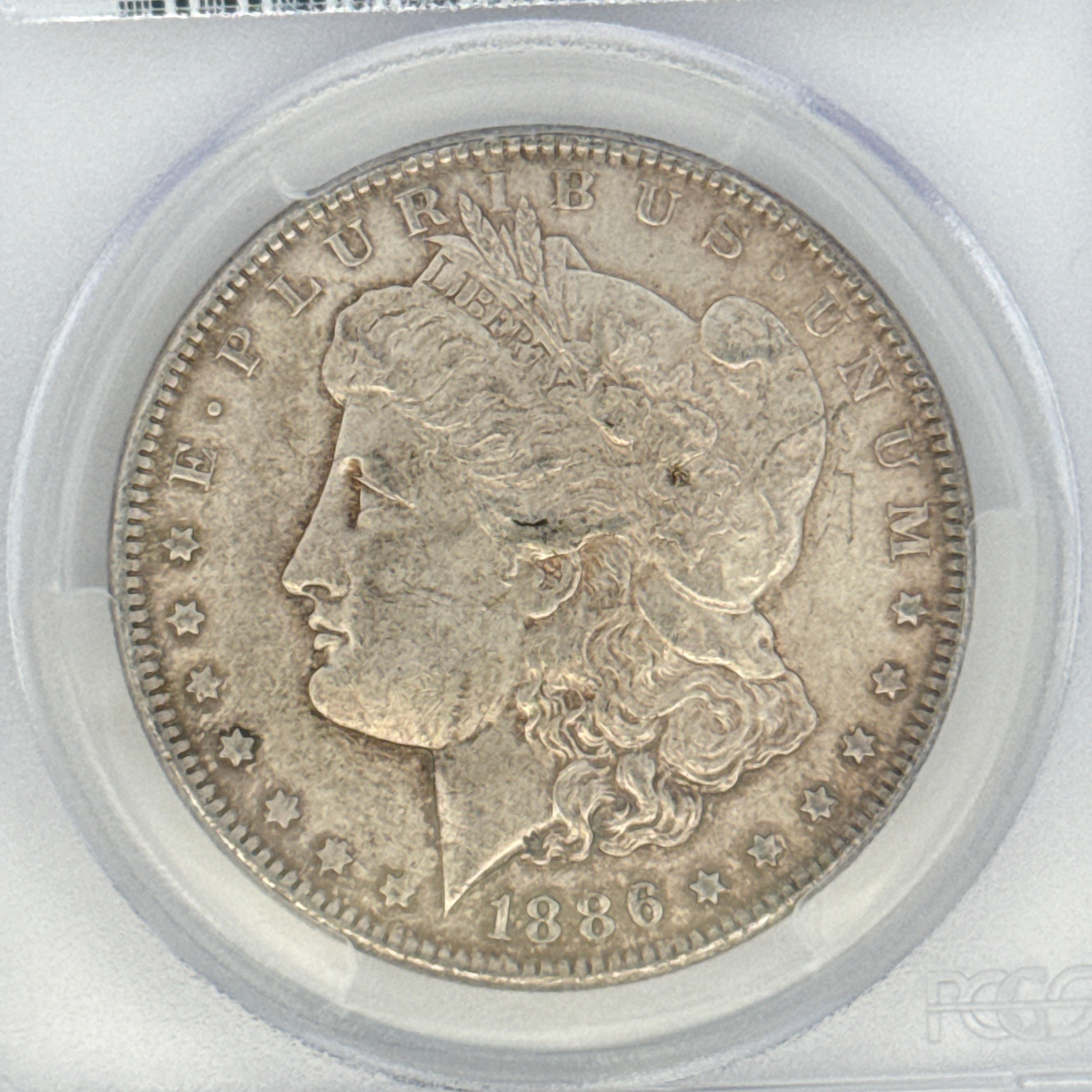 1886 Morgan Silver Dollar AU55 PCGS Graded